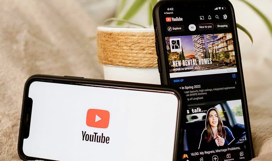 YouTube open on two phones